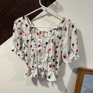 White crop blouse with square neck flutter sleeves and ruffled details